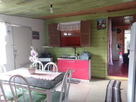 Terreno com casa  mista no loteamento Santa Catarina, Lomba Grande